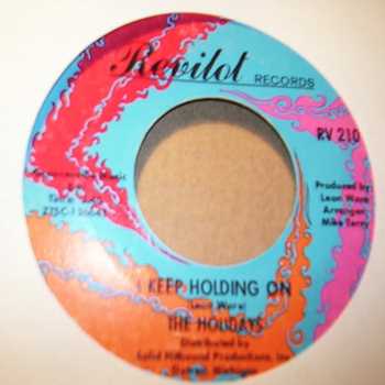 HOLIDAYS I KEEP HOLDING ON / I KNOW SHE CARES