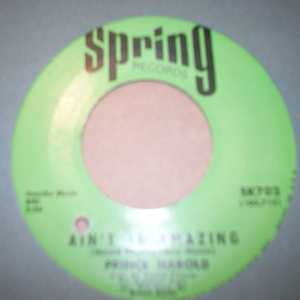 PRINCE HAROLD — AIN'T IT AMAZING / DADDY'S COMING HOME record label scan