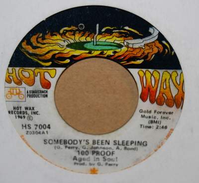 100 PROOF — SOMEBODY'S BEEN SLEEPING / I'VE COME TO SAVE YOU record label scan