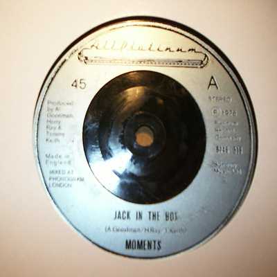 MOMENTS — JACK IN THE BOX / LOVE ON A TWO WAY STREET record label scan