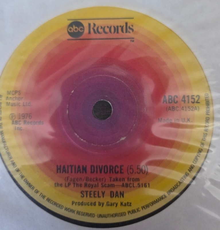 STEELY DAN — HAITIAN DIVORCE / SIGN IN STRANGER record label scan