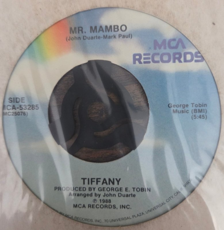 TIFFANY — I SAW HIM STANDING THERE / MR.MAMBO record label scan