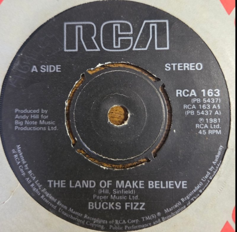 BUCKS FIZZ — THE LAND OF MAKE BELIEVE / NOW YOUR GONE record label scan