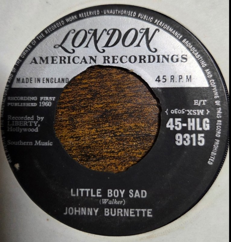 JOHNNY BURNETTE — LITTLE BOY SAD / PLEDGE OF LOVE record label scan