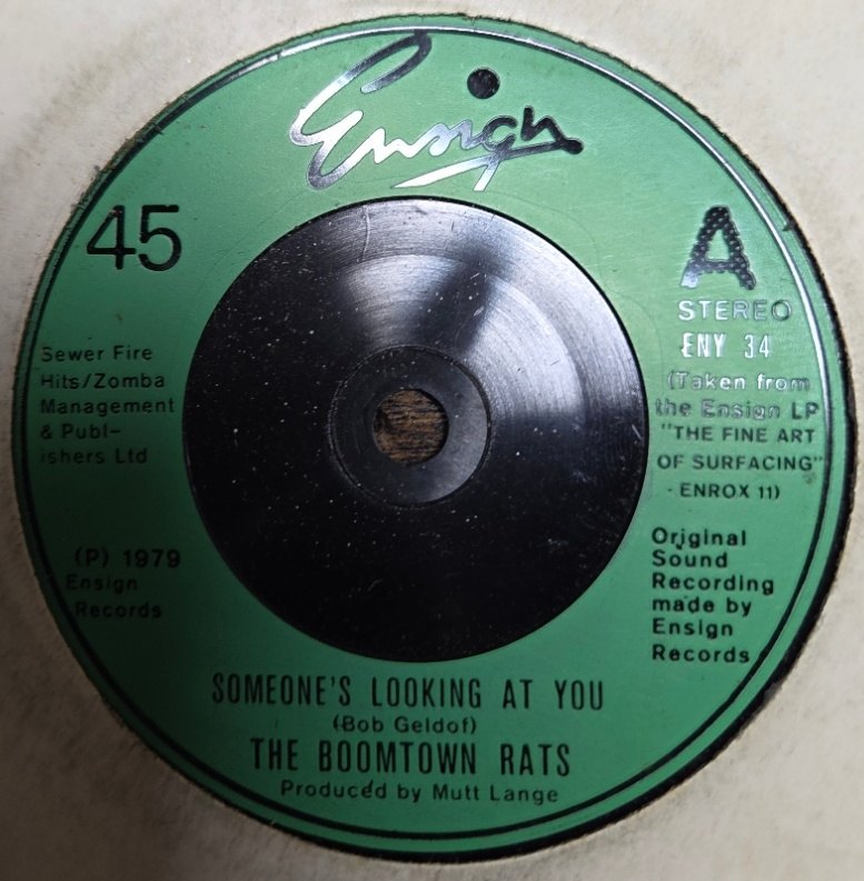 THE BOOMTOWN RATS — SOMEONE'S LOOKING AT YOU / WHEN THE NIGHT COMES record label scan