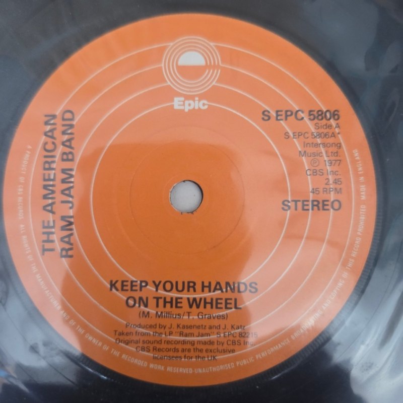 THE AMERICAN RAM JAM BAND — KEEP YOUR HANDS ON THE WHEEL / RIGHT ON THE MONEY record label scan