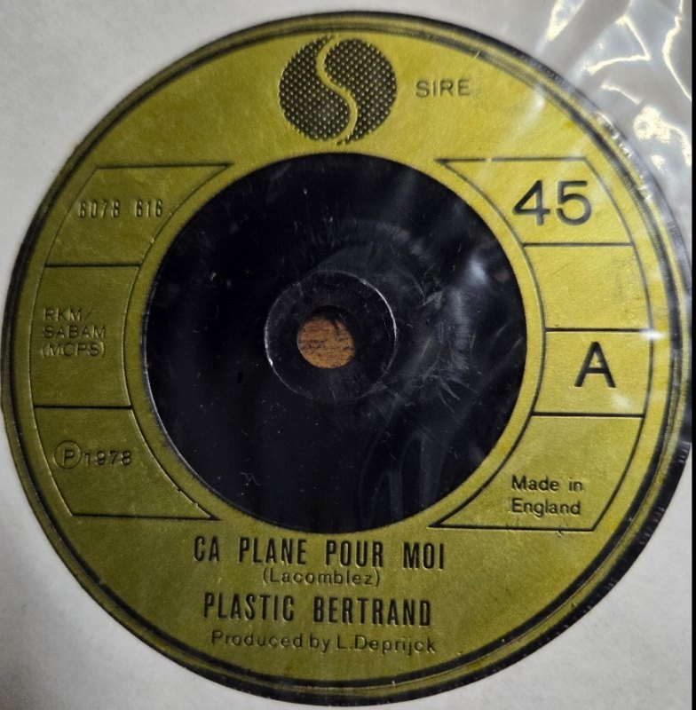 PLASTIC BERTRANO — CA PLANE POUR MOI / POGO POGO record label scan