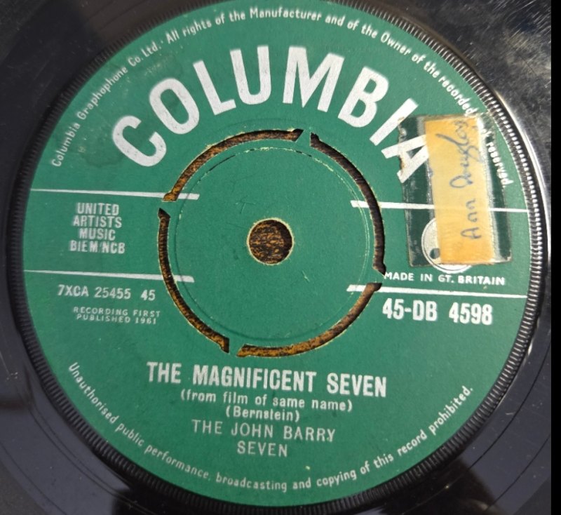 THE JOHN BARRY SEVEN — THE MAGNIFICENT SEVEN / SKID ROW record label scan