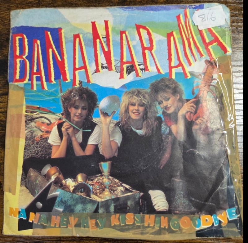 BANANARAMA — NA NA HEY HEY KISS HIM GOODBY / TELL TALE SIGNS record label scan