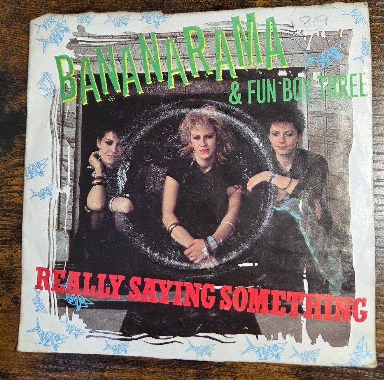BANANARAMA AND FUN BOY THREE — REALLY SAYING SOMETHING / WE WANT OUR CHEAP FARES BACK record label scan