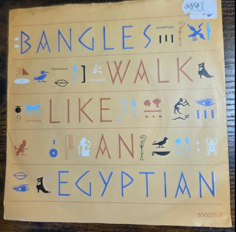 BANGLES — WALK LIKE A EGYPTIAN / NOT LIKE YOU record label scan