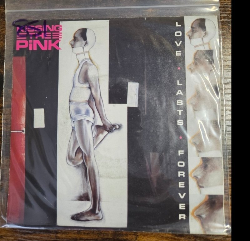 KISSING THE PINK — LOVE LASTS FOREVER / UNDERAGE record label scan