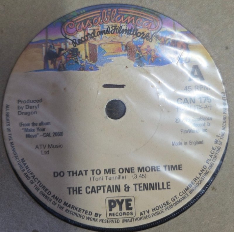 THE CAPTAIN AND TENNILLE — DO THAT TO ME ONE MORE TIME / DEEP IN THE DARK record label scan
