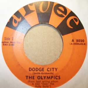 OLYMPICS — DODGE CITY / DANCE BY THE LIGHT OF THE MOON record label scan
