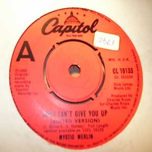 MYSTIC MERLIN — JUST CAN'T GIVE YOU UP / BURNED TO LEARN record label scan