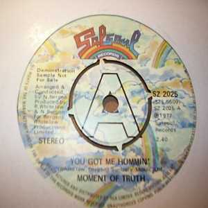 MOMENT FO TRUTH — YOU GOT ME HUMMIN' / AT LONG LAST record label scan