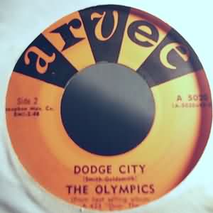 OLYMPICS — DODGE CITY / DANCE BY THE LIGHT OF THE MOON record label scan