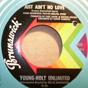 YOUNG HOLT UNLIMITED — JUST AIN'T NO LOVE  / WHO'S MAKING LOVE record label scan